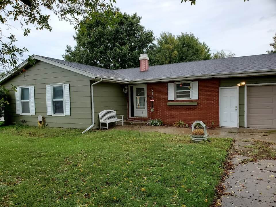 The front of a house for auction in Hardin County, Iowa.