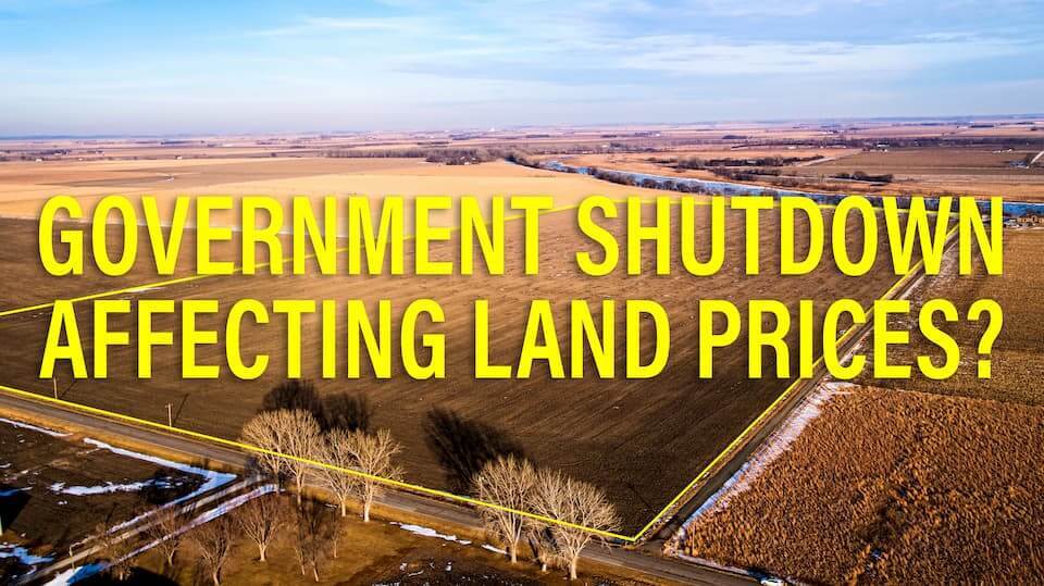 Photo of land with text, "GOVERNMENT SHUTDOWN AFFECTING LAND PRICES?"