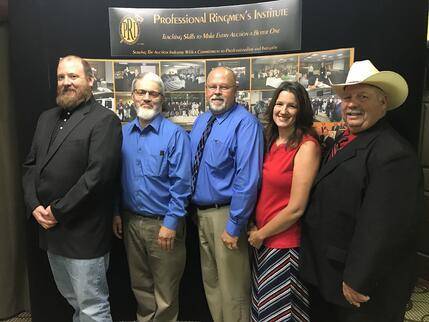 Professional auctioneers from Iowa, Nebraska, and Missouri pose for a photo.