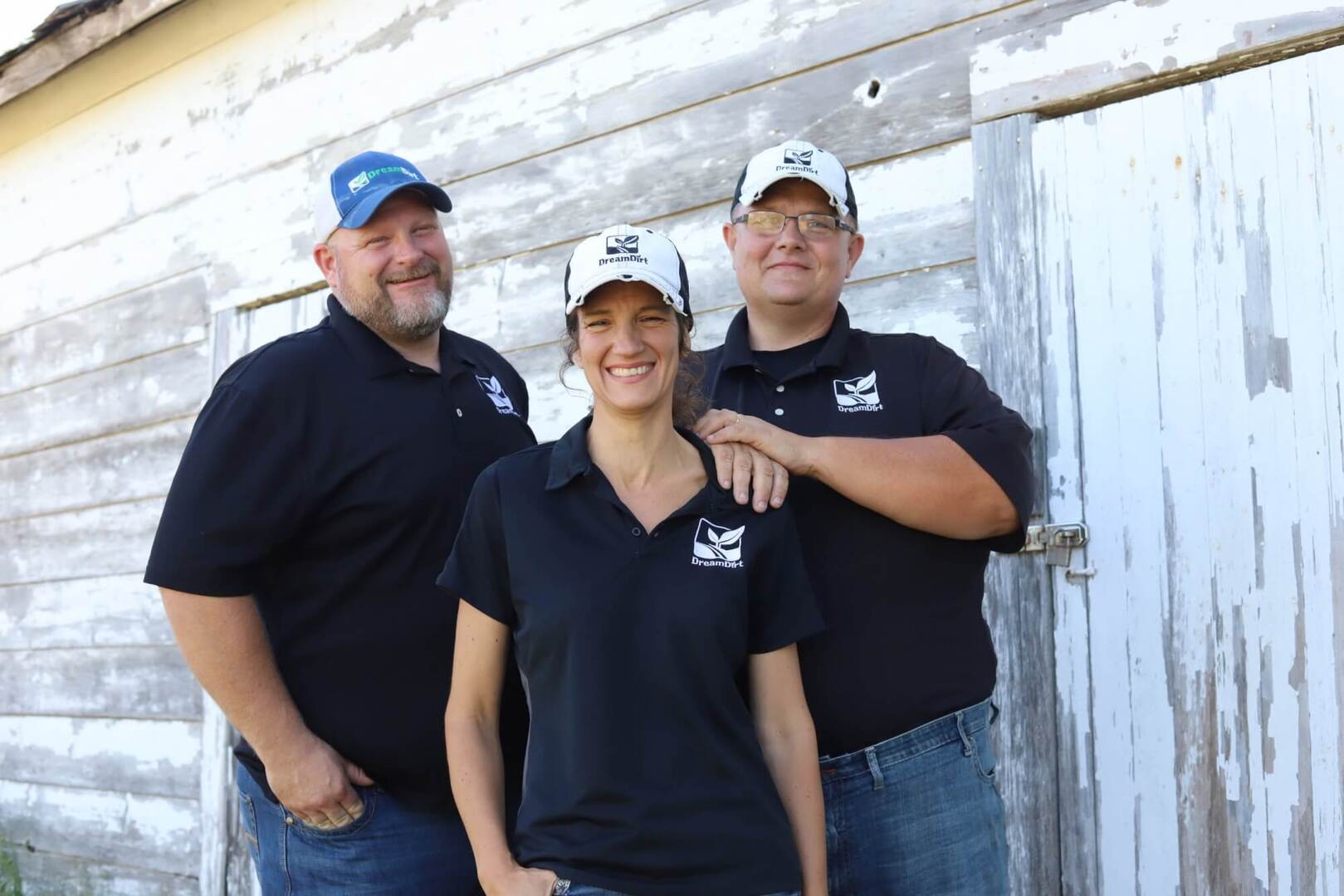 DreamDirt auctioneers and owners Jason Smith, Nicole Smith, Tom Bradley