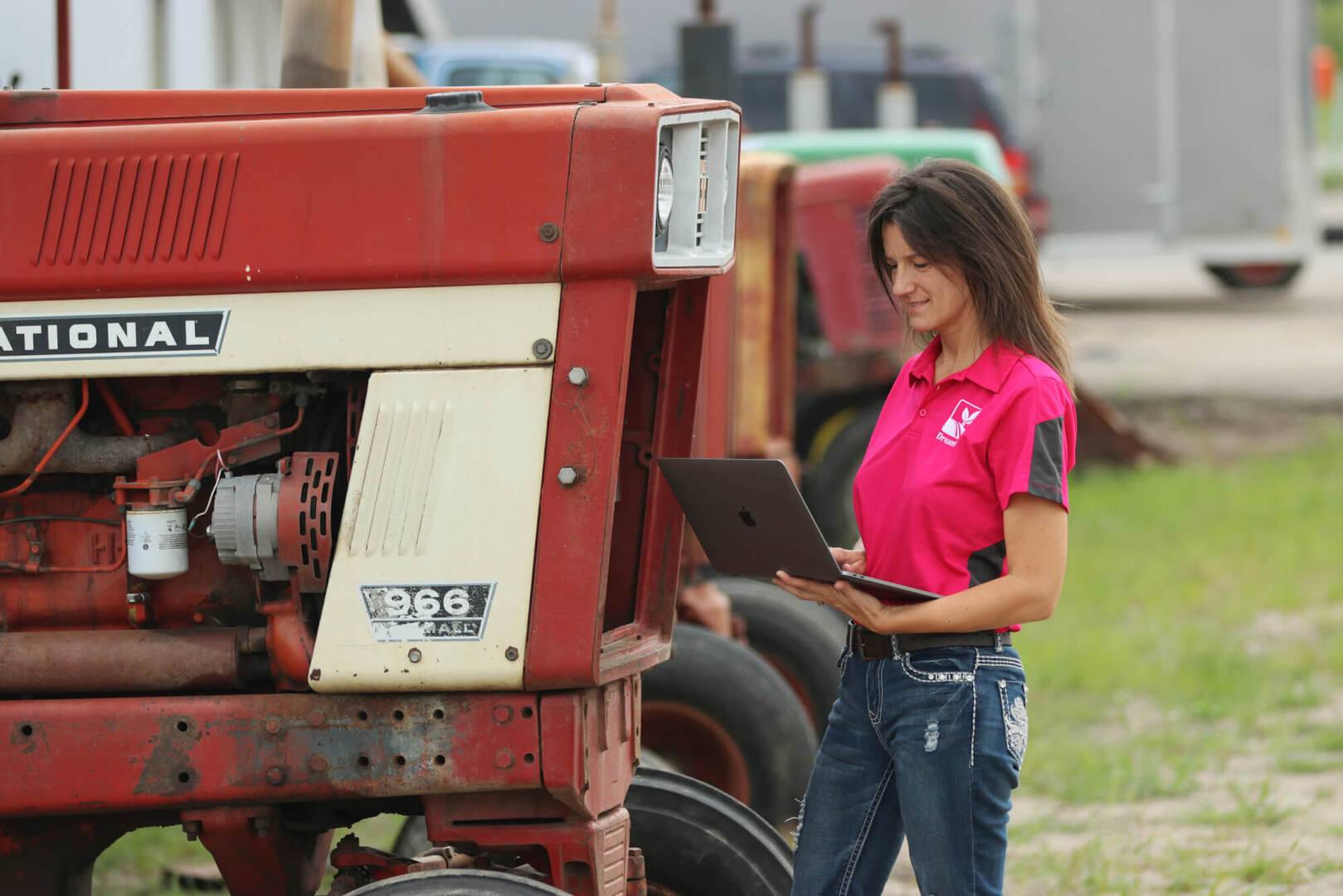 Auctioneer Lotting a Tractor